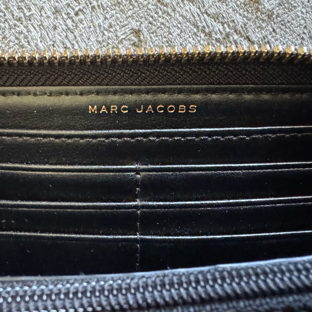 The Marc Jacobs Saffiano Leather Zip Around
Continental Wallet - $195 MSRP - Picture 8 of 8